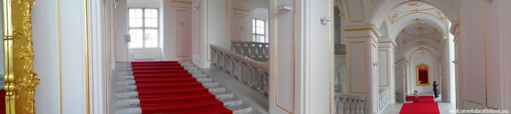 A long red carpet covers all the stairs